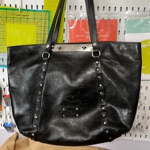 Gorgeous black metallic embossed map weekender by Patricia Nash Rare Bag